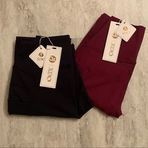 NWT- 2 pairs of Women’s Yoga leggings with two pockets-  size Small